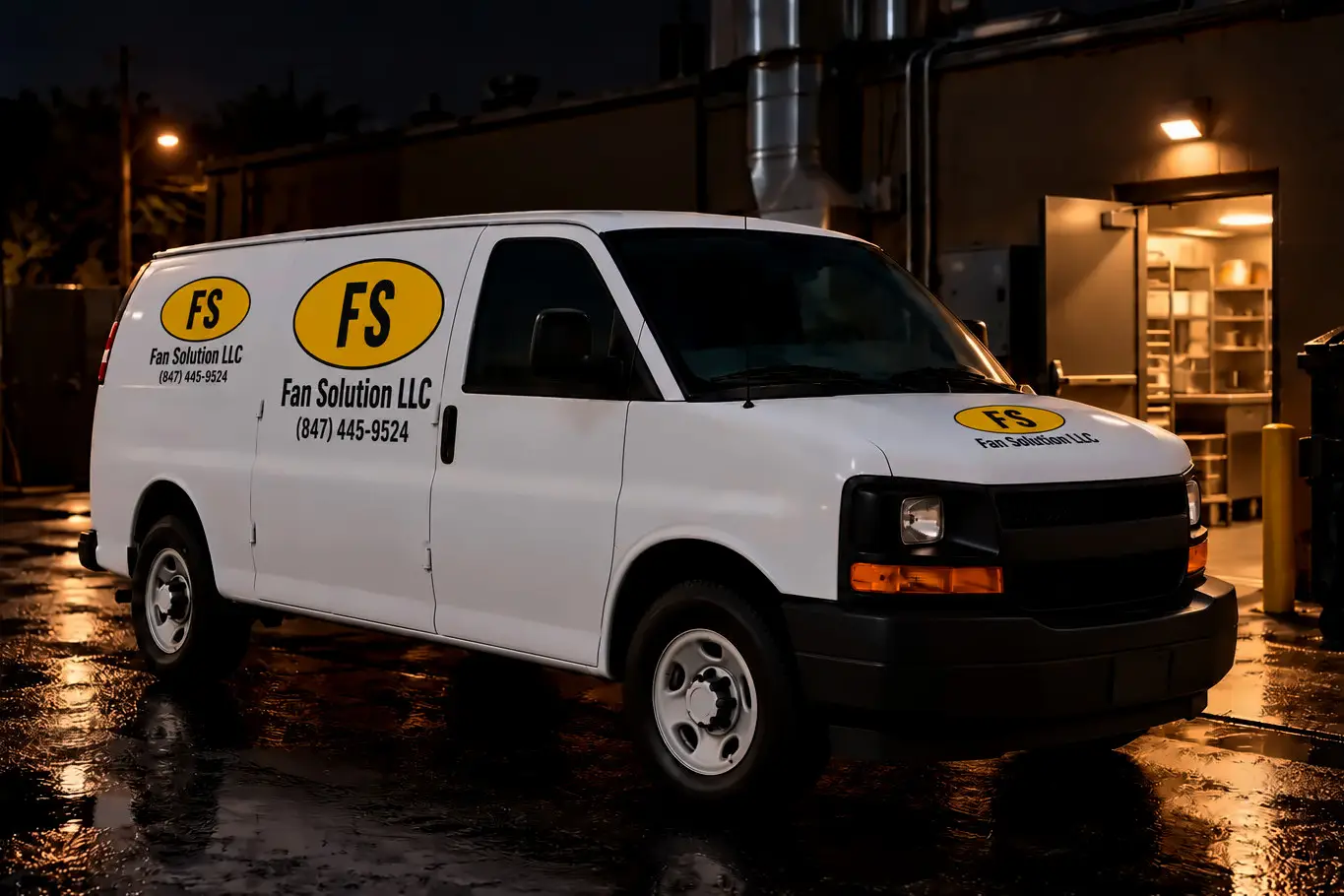 Fan Solution LLC service van parked behind a restaurant kitchen at night